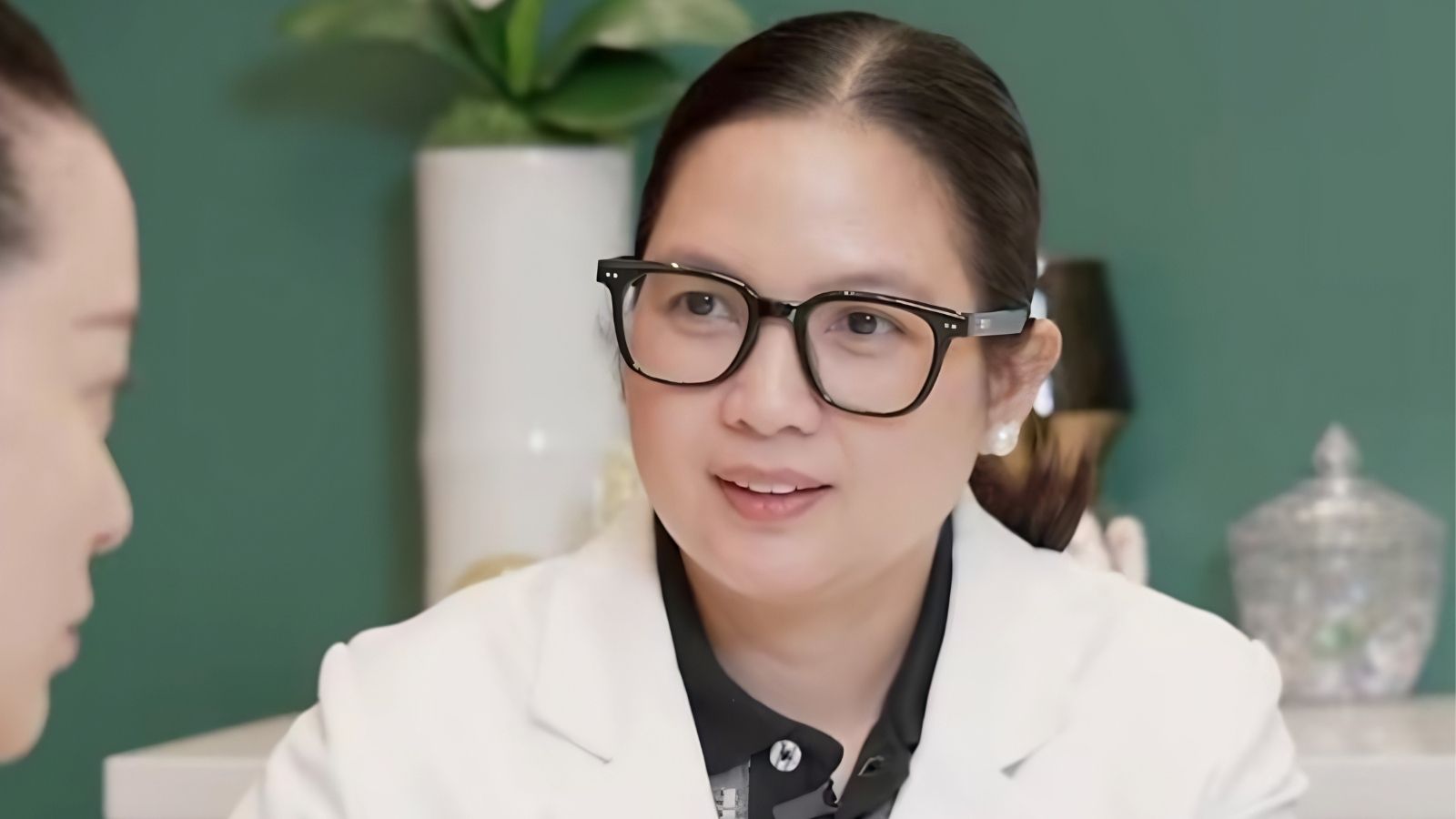 Dermatologist or aesthetic clinic: Dr. Erika Velasco of Velasco Medical Aesthetics, an aesthetic and skin health clinic in Bonifacio Global City, Taguig, in consultation with a patient.
